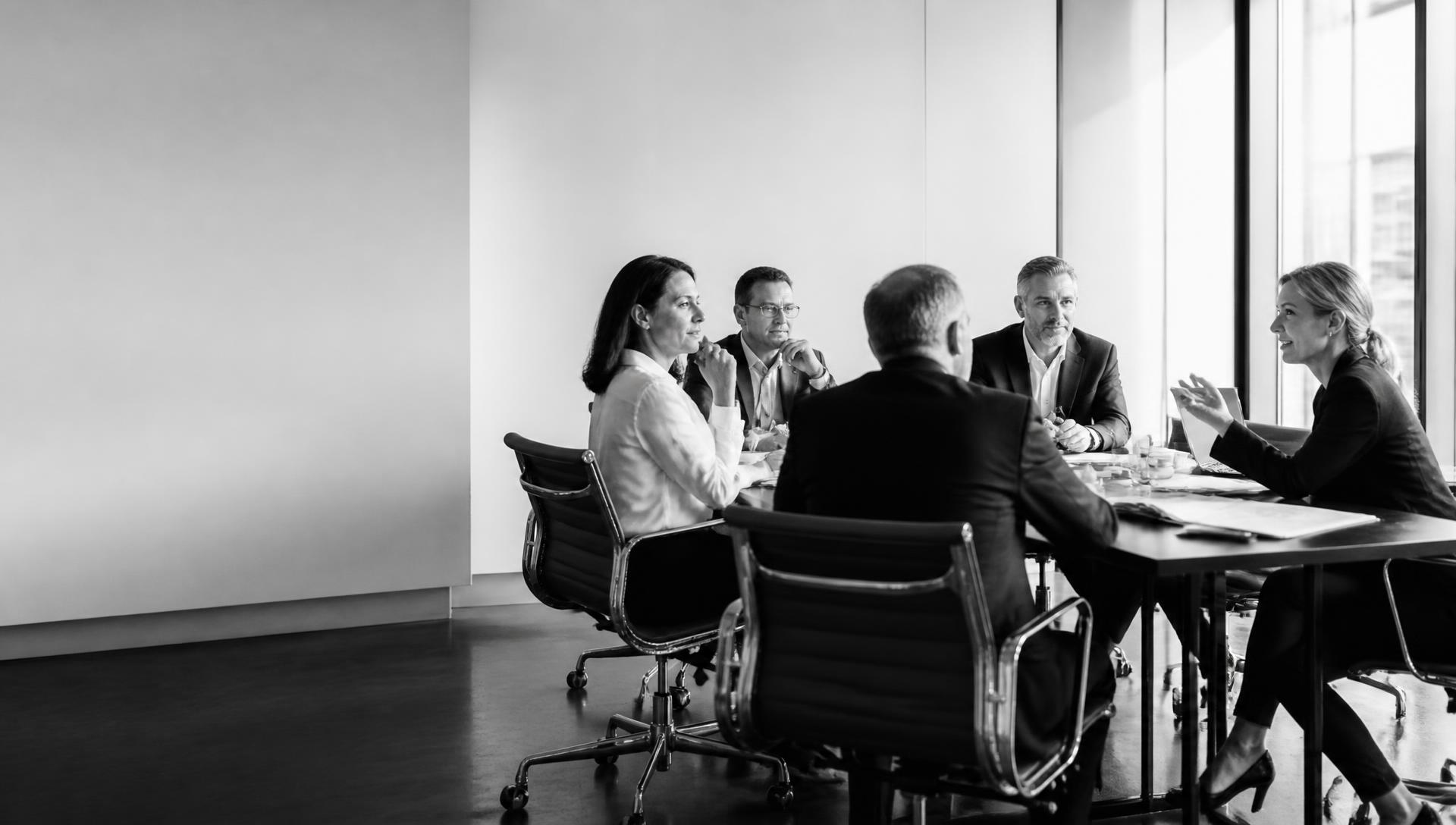Senior leadership team in a facilitated growth-planning discussion